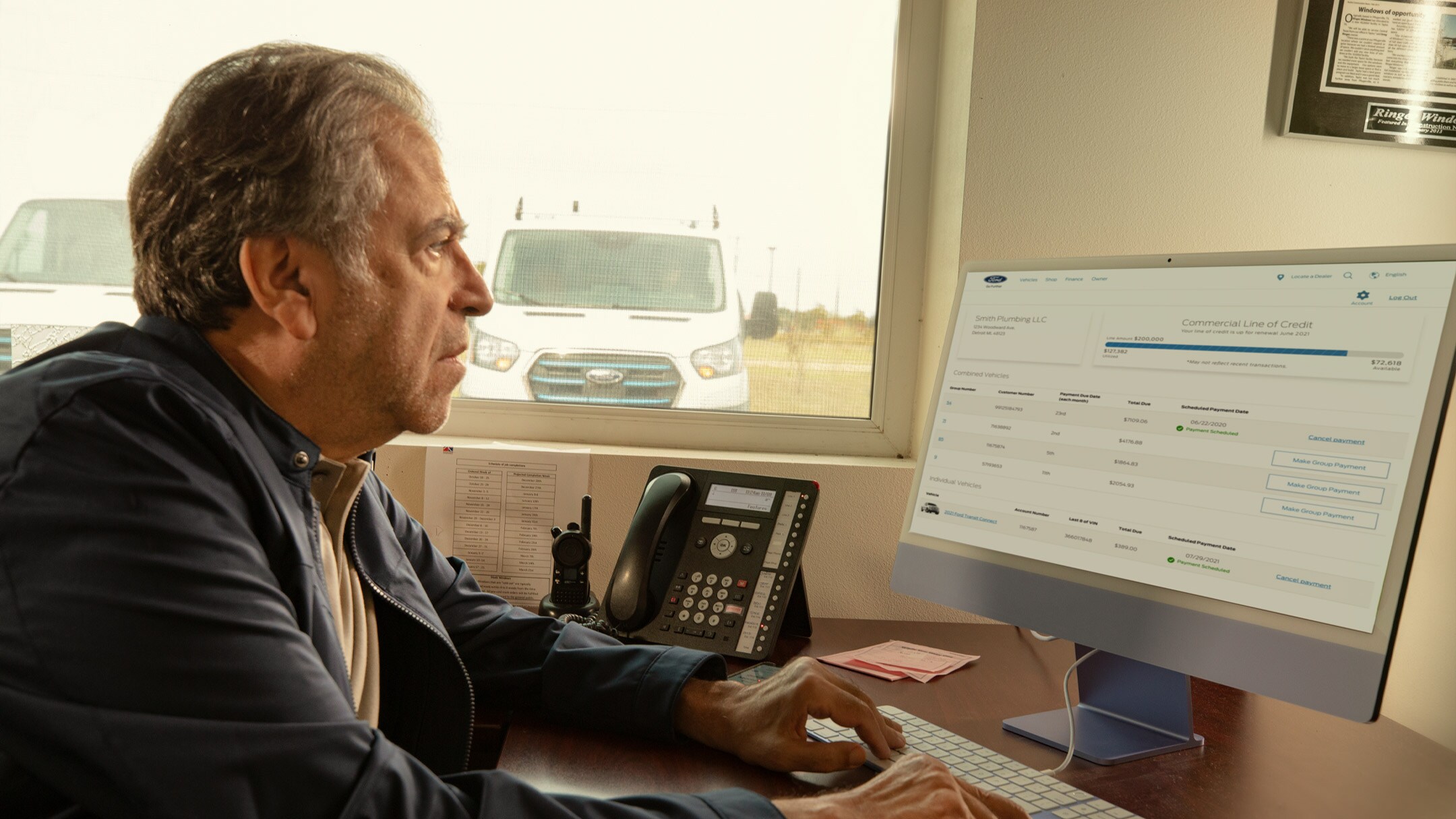 Person checking Fleet management on computer