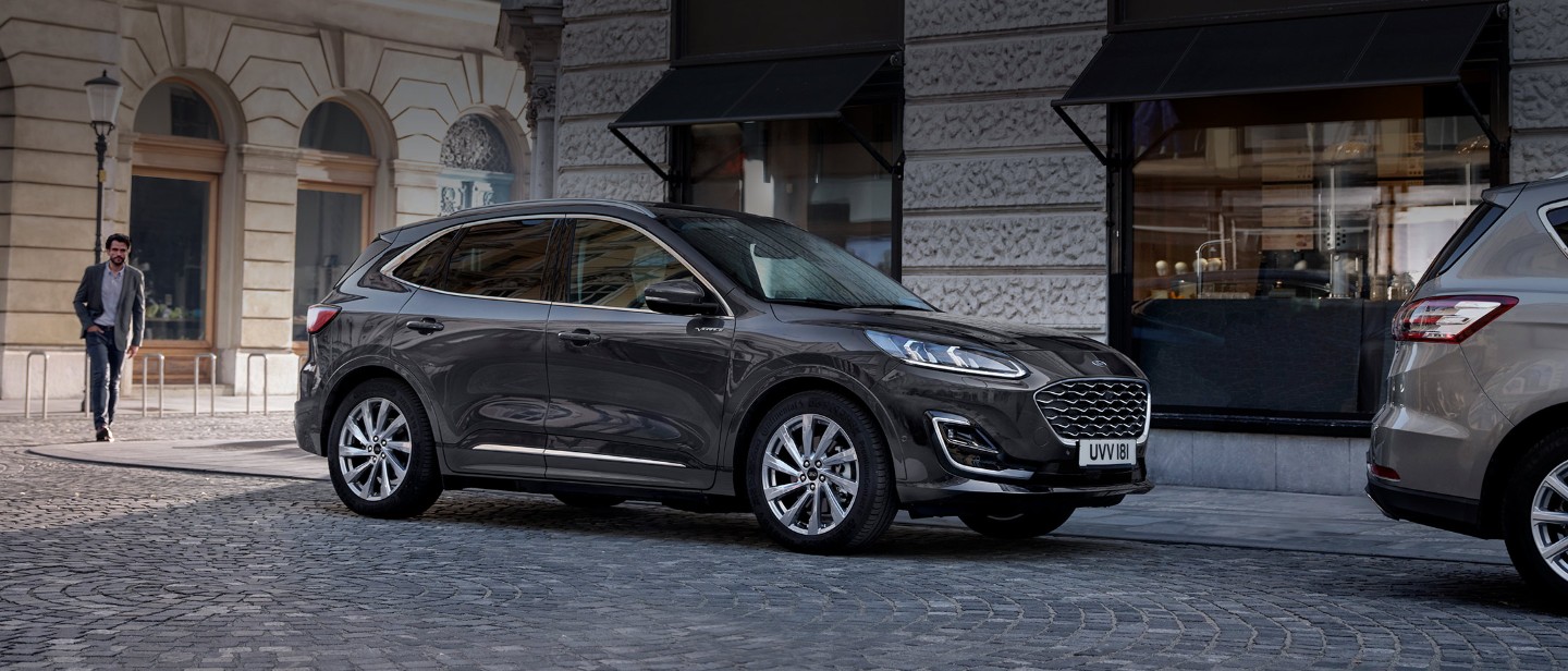 Grey Ford Kuga parked on street
