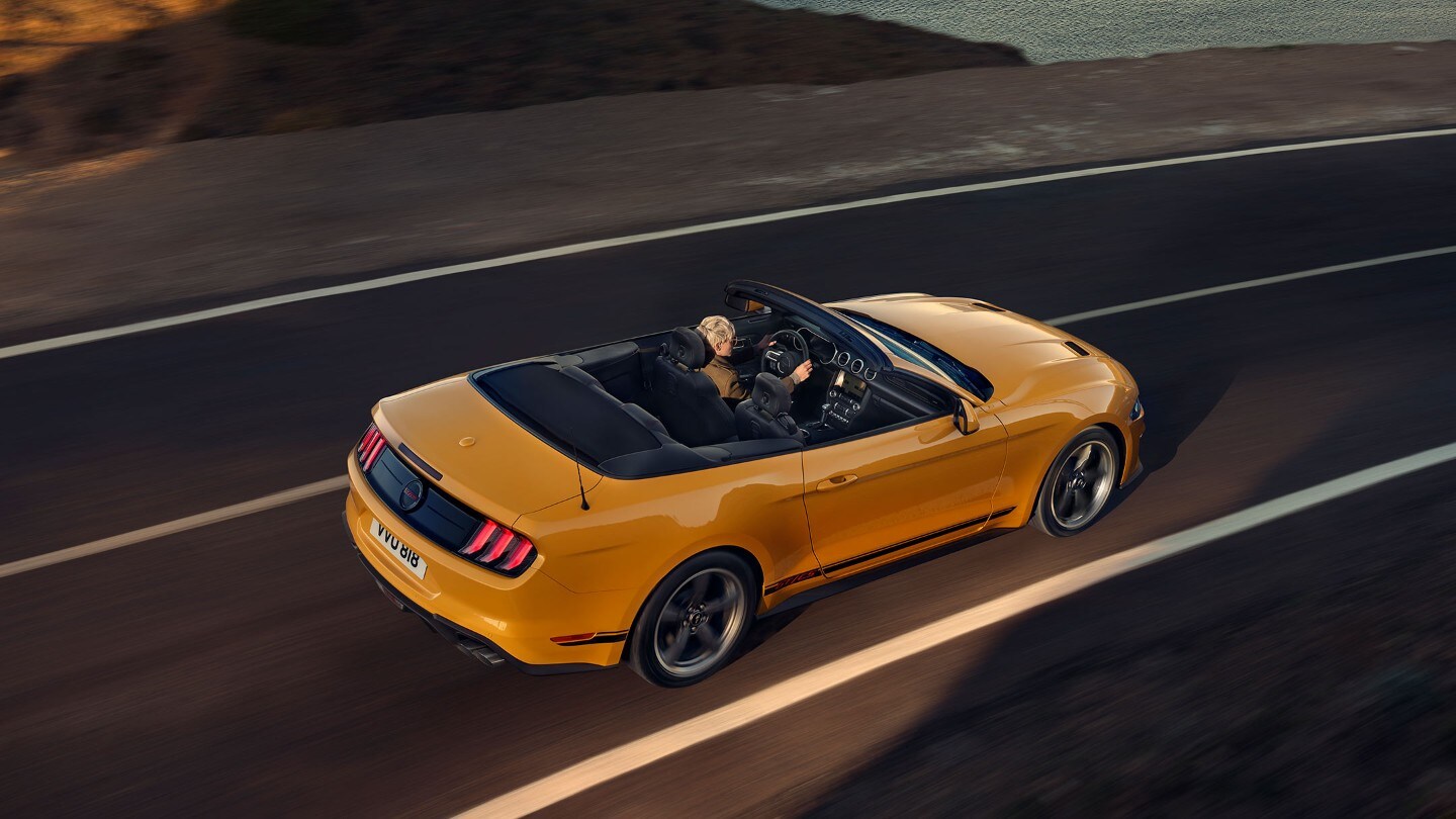 Ford Mustang California Edition viewed from above driving along a highway.