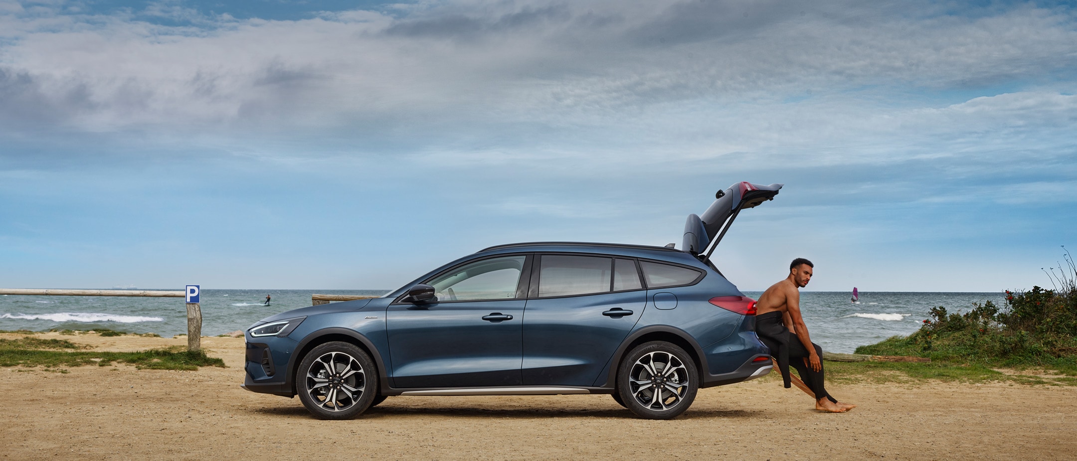 Ford Focus in side view parked on a beach