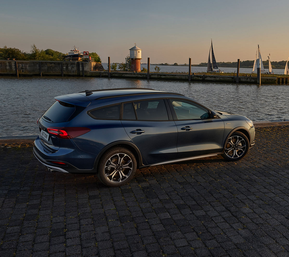 Ford Focus in side view parked by a lake