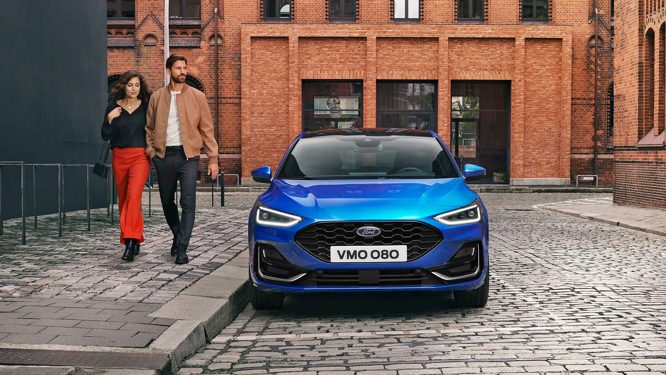 Honeycomb front grille on a blue Ford Focus