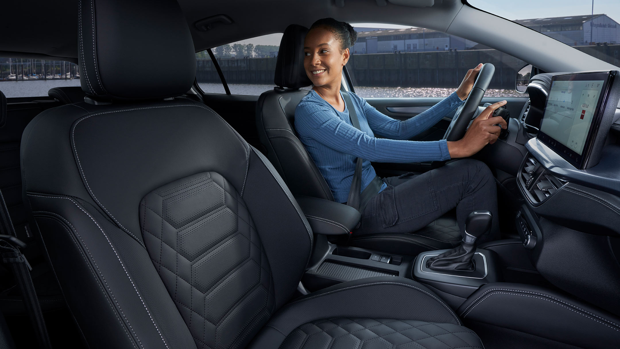 Woman driving a Ford Focus