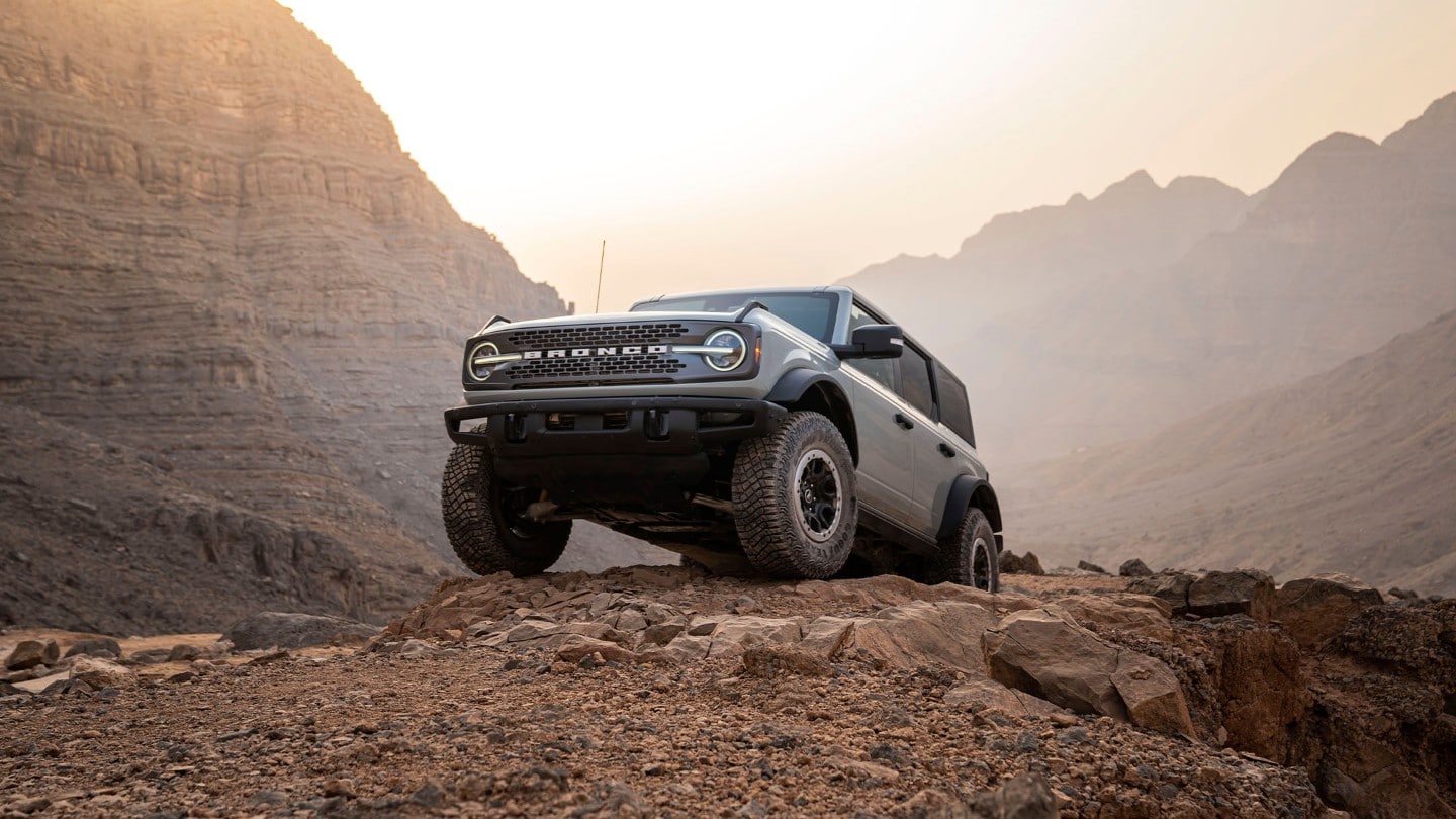 Ford Bronco front view parked on rocks in the desert mountains