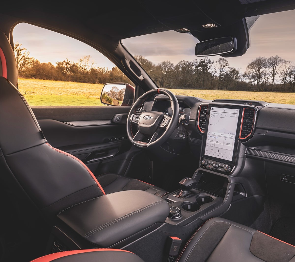 New Ford Ranger Raptor interior with the steering wheel and centre console with touchscreen