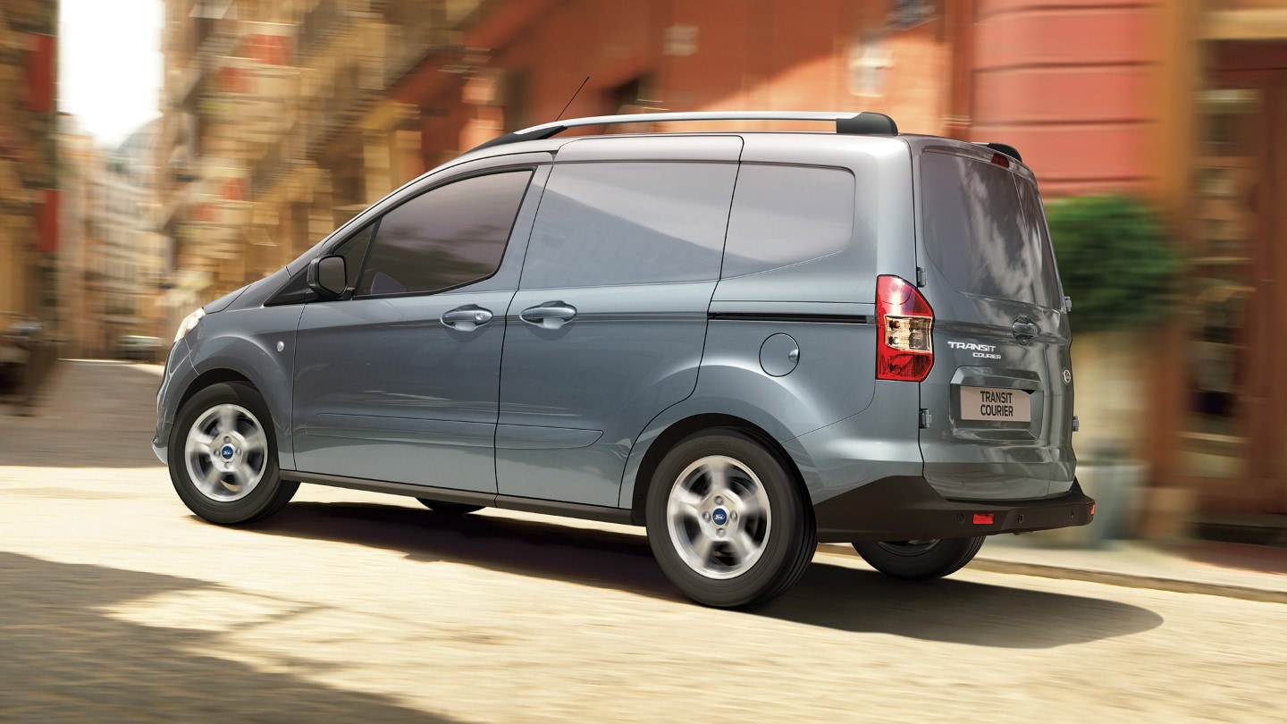 Ford Transit Courier in motion going uphill