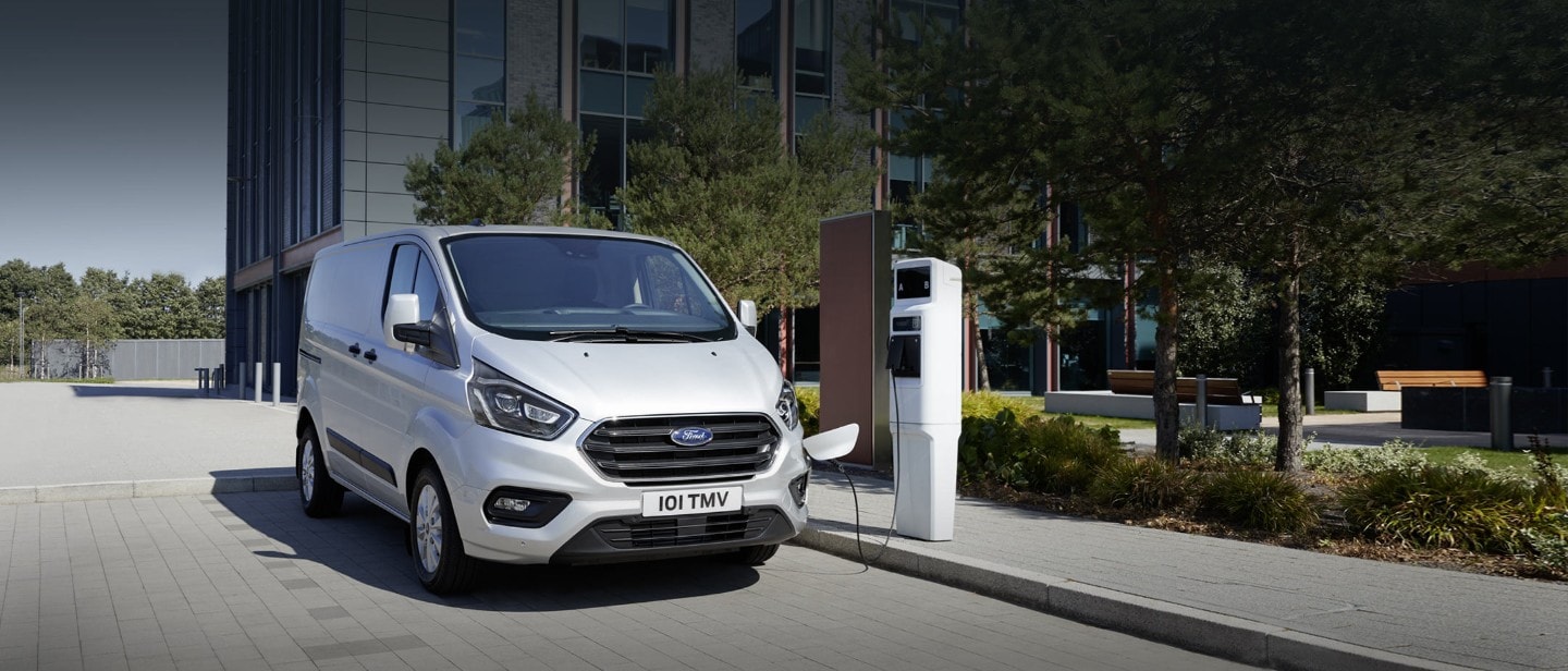 New Ford Transit Custom PHEV being charged from charging point New Ford Transit Custom PHEV being charged from charging point