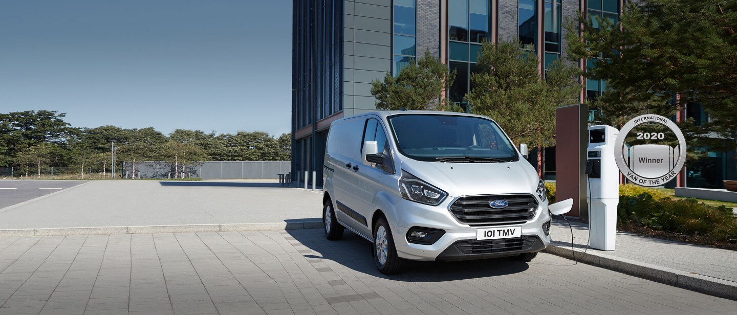 New Ford Transit Custom PHEV being charged from charging point New Ford Transit Custom PHEV being charged from charging point