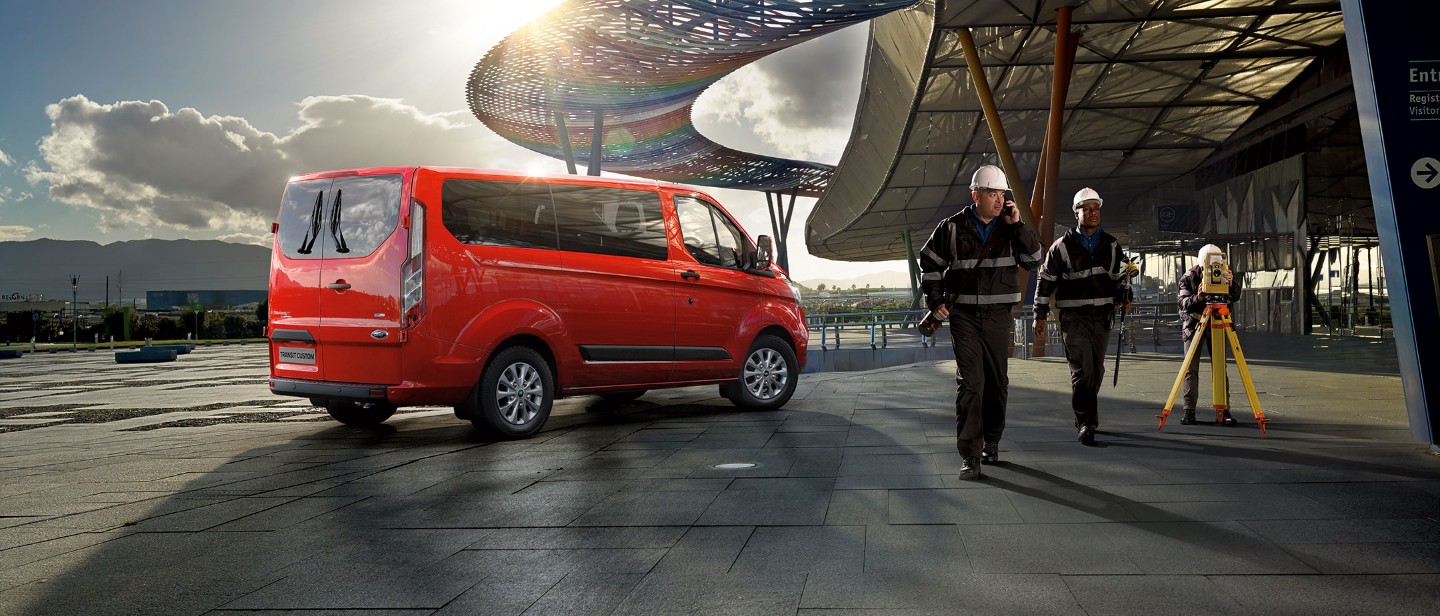 New Red Ford Transit Custom at construction site