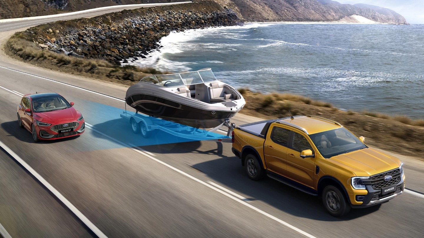 All-New Ford Ranger on coastal road with blind spot sensor graphic