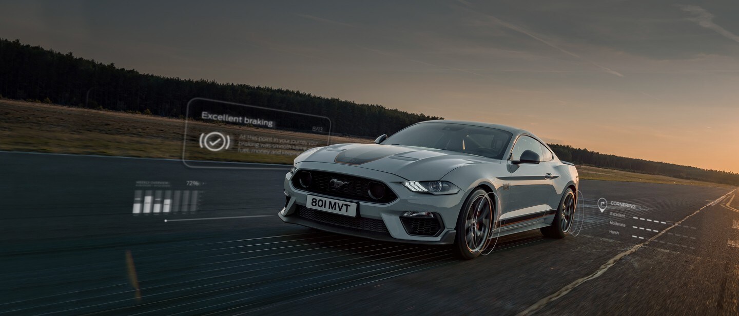 Ford Mustang driving on the road